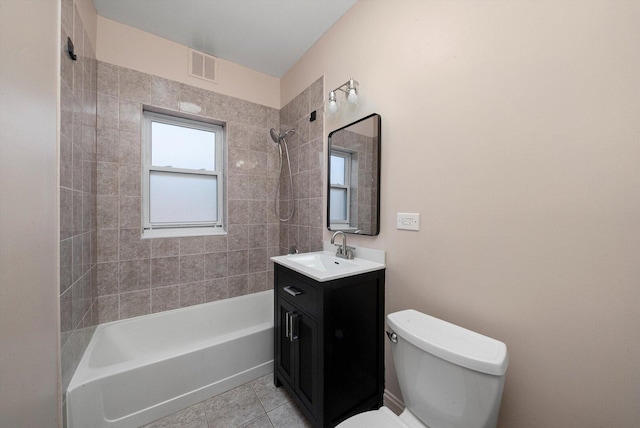4860 W Warner Ave Unit 1, Chicago, IL 60641 - full bath with  shower combination, toilet, vanity, and tile patterned floors