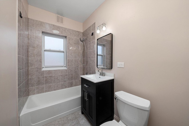 4860 W Warner Ave Unit 1, Chicago, IL 60641 - full bath featuring bathing tub / shower combination, toilet, vanity, and tile patterned floors