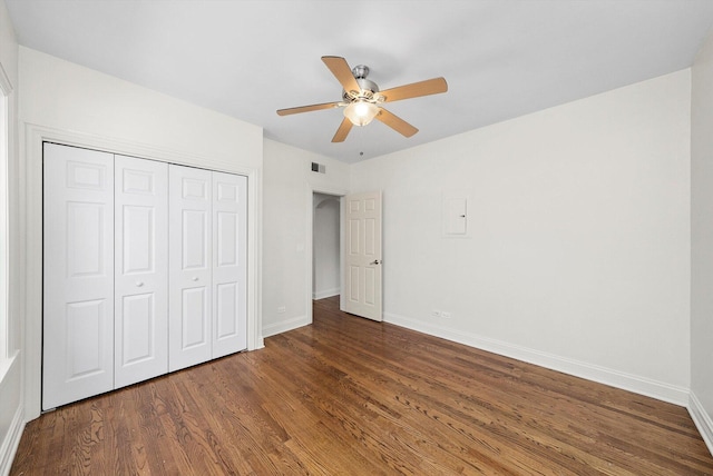 4860 W Warner Ave Unit 1, Chicago, IL 60641 - unfurnished bedroom with baseboards, wood finished floors, a closet, and a ceiling fan