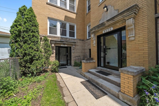4860 W Warner Ave Unit 1, Chicago, IL 60641 - view of exterior entry with brick siding