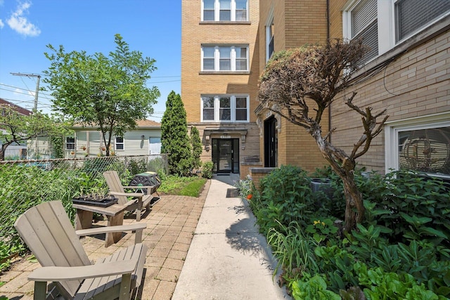 4860 W Warner Ave Unit 1, Chicago, IL 60641 - entrance to property with brick siding