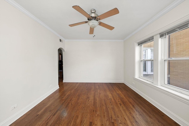 4860 W Warner Ave Unit 1, Chicago, IL 60641 - unfurnished room with ornamental molding, arched walkways, wood finished floors, baseboards, and ceiling fan