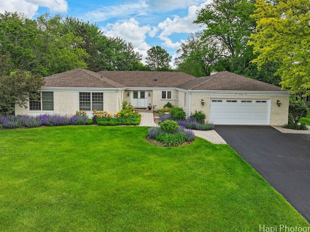 275 Surrey Ln, Barrington, IL 60010 - ranch-style home featuring a garage, brick siding, driveway, and a front lawn