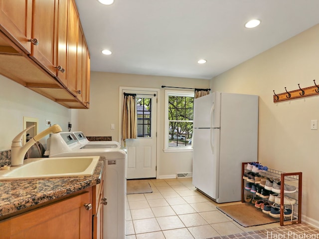 275 Surrey Ln, Barrington, IL 60010 - laundry room featuring recessed lighting, light tile patterned floors, washer and dryer, and cabinet space