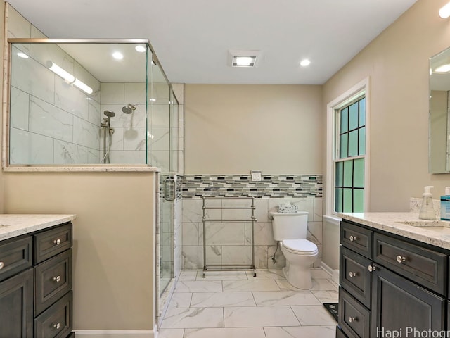 275 Surrey Ln, Barrington, IL 60010 - bathroom featuring marble finish flooring, vanity, a shower stall, recessed lighting, and toilet