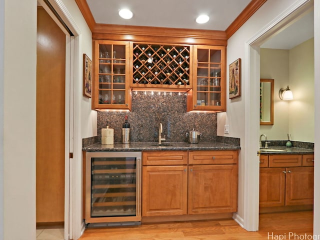 275 Surrey Ln, Barrington, IL 60010 - indoor wet bar with beverage cooler, tasteful backsplash, ornamental molding, and light wood-style flooring
