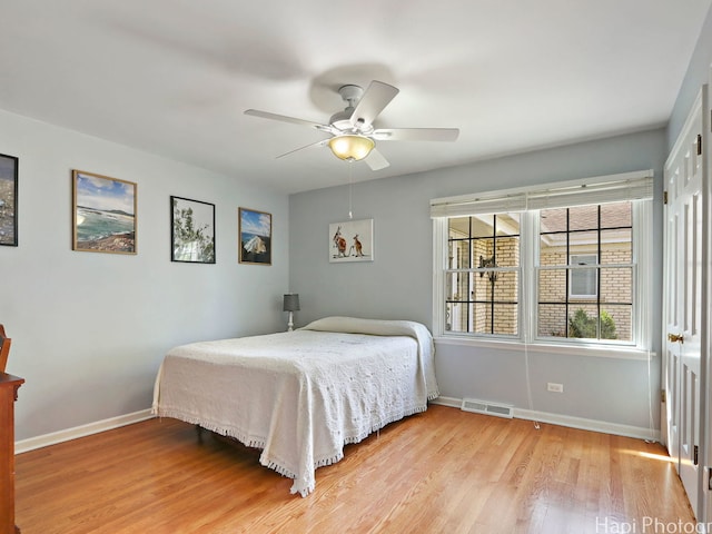275 Surrey Ln, Barrington, IL 60010 - bedroom with light wood finished floors and a ceiling fan