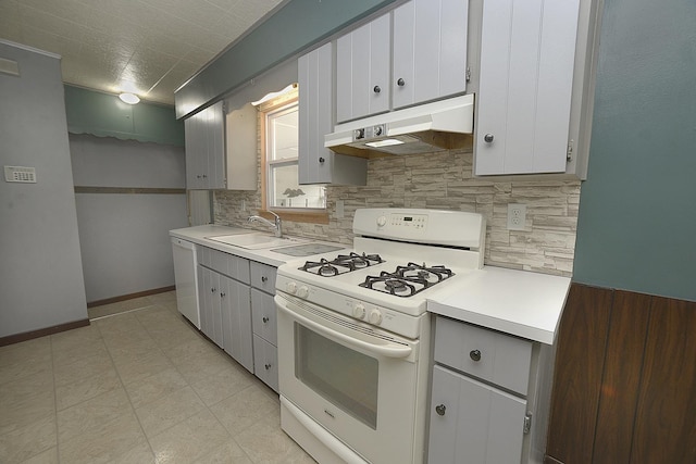 610 E Main St, Ottawa, IL 61350 - kitchen featuring white appliances, under cabinet range hood, a sink, light countertops, and tasteful backsplash