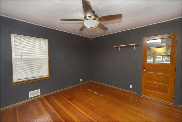 610 E Main St, Ottawa, IL 61350 - unfurnished room featuring wood finished floors, ceiling fan, and baseboards