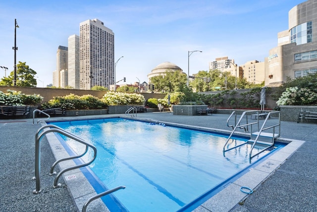330 W Diversey Pkwy Unit 1209, Chicago, IL 60657 - community pool featuring a city view and a patio