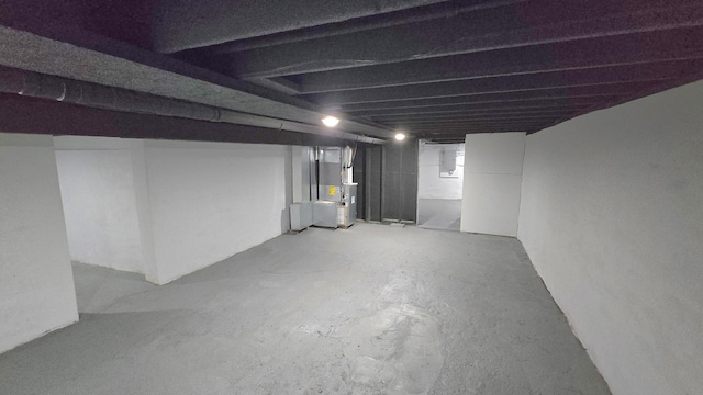 basement featuring heating unit