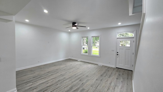 entrance foyer featuring ceiling fan, wood finished floors, recessed lighting, and baseboards
