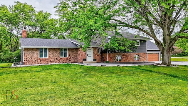 2531 E 1669th Rd, Ottawa, IL 61350 - view of front facade with brick siding, a front lawn, and a chimney