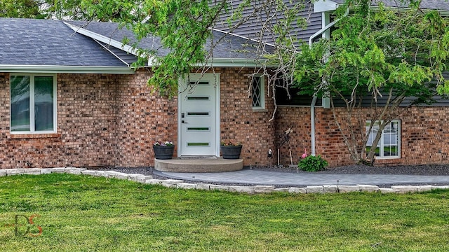 2531 E 1669th Rd, Ottawa, IL 61350 - entrance to property with a lawn, brick siding, and roof with shingles