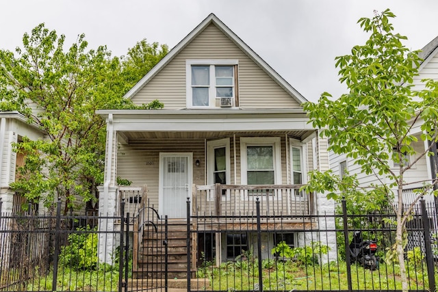 1508 W 72nd St, Chicago, IL 60636 - view of front facade featuring a porch, a fenced front yard, and a gate