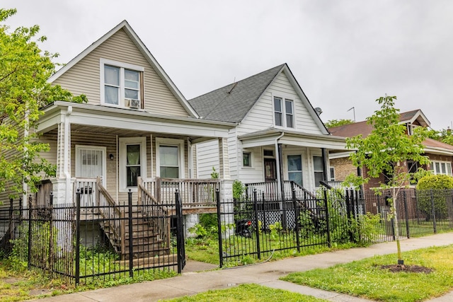1508 W 72nd St, Chicago, IL 60636 - view of front of property featuring a porch, a fenced front yard, stairway, and a gate