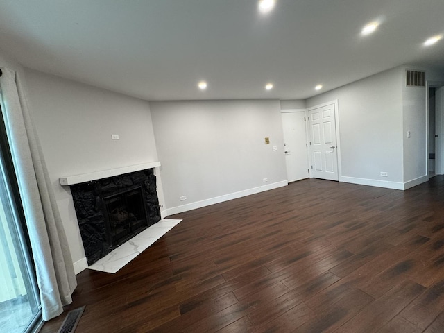 1021 Boxwood Ct Unit C1, Wheeling, IL 60090 - unfurnished living room with a premium fireplace, recessed lighting, dark wood-type flooring, and baseboards
