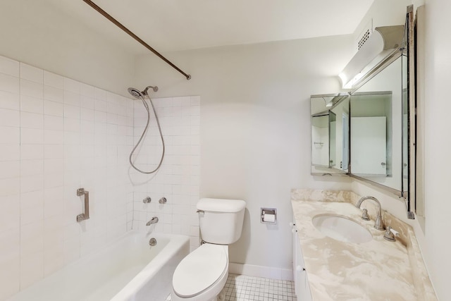 5415 N Sheridan Rd Unit 4511, Chicago, IL 60640 - bathroom featuring washtub / shower combination, vanity, toilet, tile patterned flooring, and baseboards