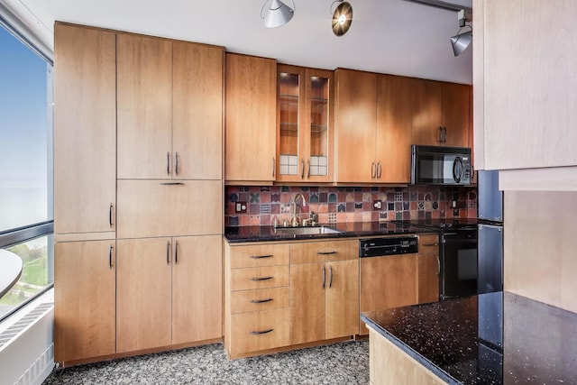 5415 N Sheridan Rd Unit 4511, Chicago, IL 60640 - kitchen with black microwave, a sink, range with electric cooktop, dishwasher, and dark stone counters