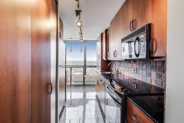 5415 N Sheridan Rd Unit 4511, Chicago, IL 60640 - kitchen featuring black appliances, a sink, tasteful backsplash, brown cabinets, and dark stone counters
