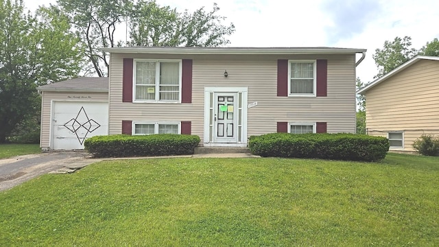 17710 Hillcrest Dr, Country Club Hills, IL 60478 - bi-level home featuring a front lawn, an attached garage, and asphalt driveway