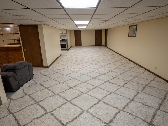 1707 Frediani Ct, Mount Prospect, IL 60056 - finished below grade area featuring a paneled ceiling, light colored carpet, and baseboards