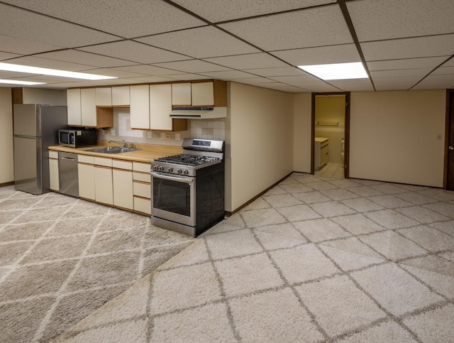 1707 Frediani Ct, Mount Prospect, IL 60056 - kitchen with stainless steel appliances, a sink, range hood, light countertops, and a paneled ceiling