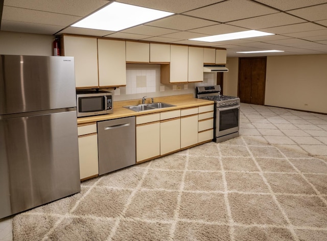 1707 Frediani Ct, Mount Prospect, IL 60056 - kitchen with stainless steel appliances, a sink, a drop ceiling, light countertops, and under cabinet range hood