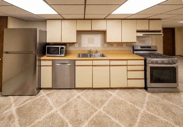 1707 Frediani Ct, Mount Prospect, IL 60056 - kitchen with appliances with stainless steel finishes, a sink, a paneled ceiling, and cream cabinetry