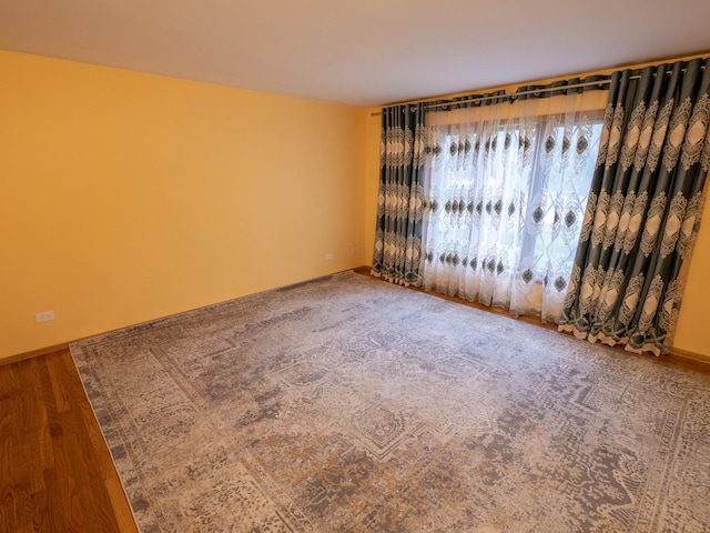 1707 Frediani Ct, Mount Prospect, IL 60056 - spare room with baseboards and wood finished floors