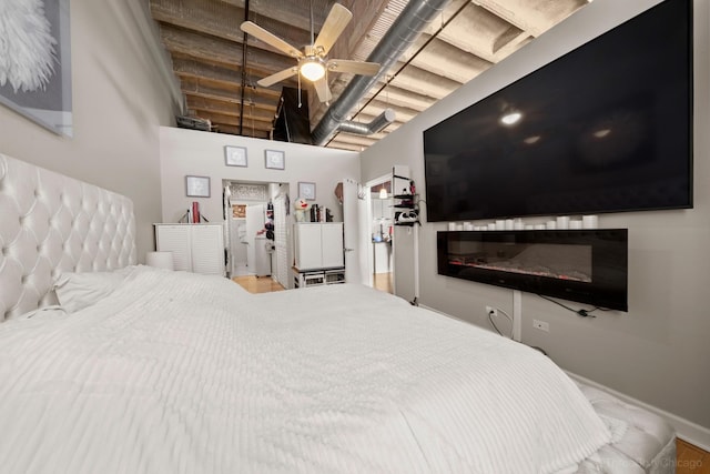 2545 S Dearborn St Unit 405, Chicago, IL 60616 - bedroom with baseboards and a ceiling fan