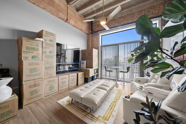 2545 S Dearborn St Unit 405, Chicago, IL 60616 - living area with a high ceiling and light wood-type flooring