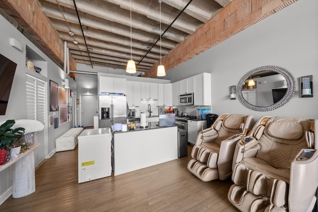 2545 S Dearborn St Unit 405, Chicago, IL 60616 - living area featuring dark wood-style floors and a high ceiling