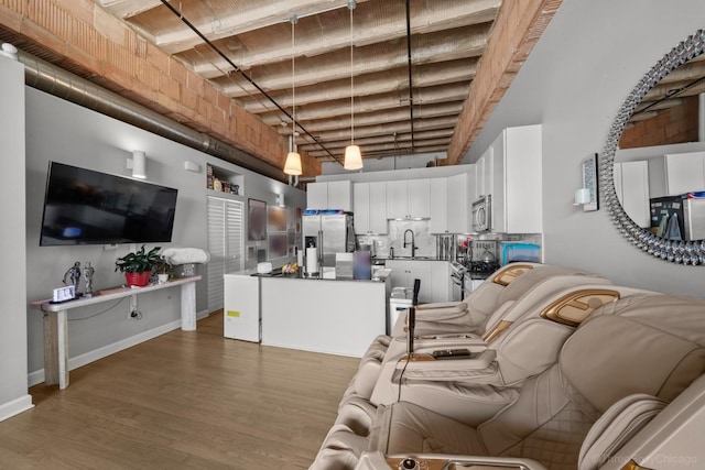 2545 S Dearborn St Unit 405, Chicago, IL 60616 - living room with wood finished floors