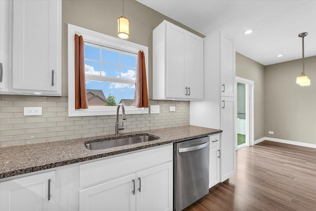 3311 Memory Ln E, Unit East, Urbana, IL 61802 - kitchen with dishwasher, a sink, baseboards, white cabinetry, and dark wood finished floors