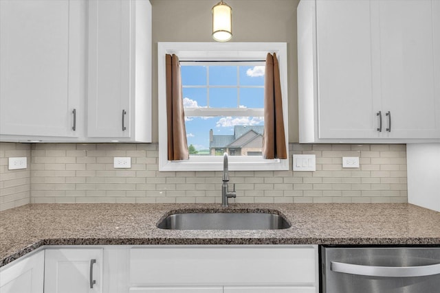 3311 Memory Ln E, Unit East, Urbana, IL 61802 - kitchen with dishwasher, a sink, white cabinetry, and decorative backsplash
