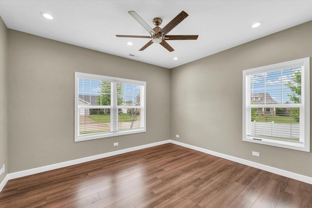 3311 Memory Ln E, Unit East, Urbana, IL 61802 - empty room with wood finished floors, a ceiling fan, baseboards, and recessed lighting