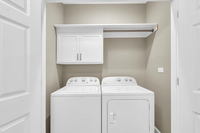 3311 Memory Ln E, Unit East, Urbana, IL 61802 - washroom with washing machine and clothes dryer and cabinet space