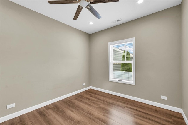 3311 Memory Ln E, Unit East, Urbana, IL 61802 - unfurnished room featuring baseboards, a ceiling fan, wood finished floors, and recessed lighting