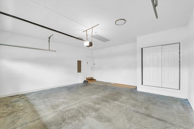 3311 Memory Ln E, Unit East, Urbana, IL 61802 - garage featuring electric panel and a garage door opener