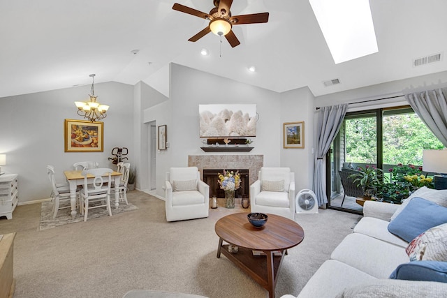 986 W Ct Unit C, Naperville, IL 60563 - living room featuring vaulted ceiling, light carpet, a high end fireplace, a chandelier, and ceiling fan
