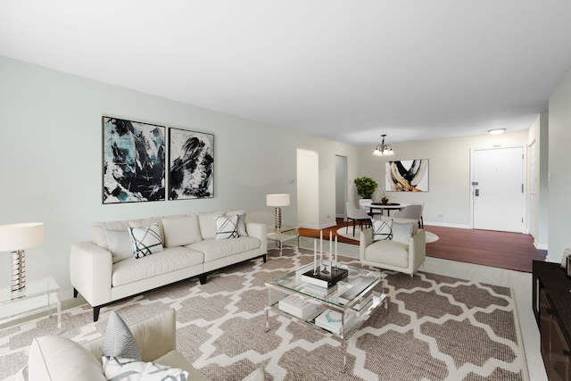 3350 N Carriageway Dr Unit 208, Arlington Heights, IL 60004 - living area with a chandelier and baseboards
