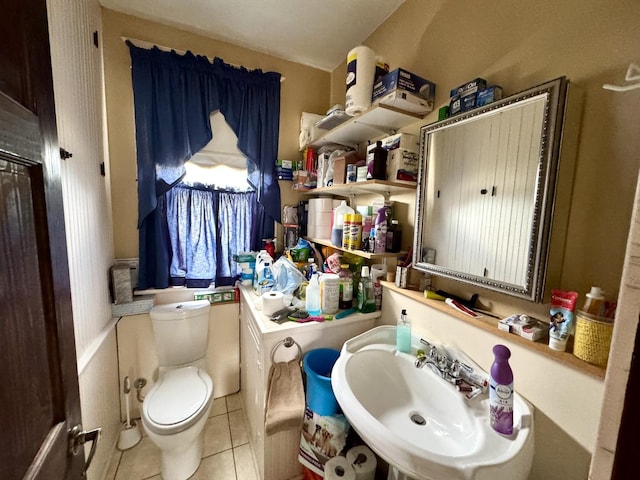 236 S Randolph St, Princeton, IL 61356 - bathroom with a sink, tile patterned floors, and toilet