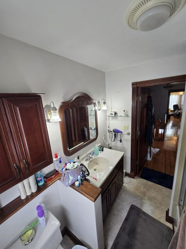 236 S Randolph St, Princeton, IL 61356 - bedroom featuring wood finished floors, ornamental molding, multiple windows, and baseboards