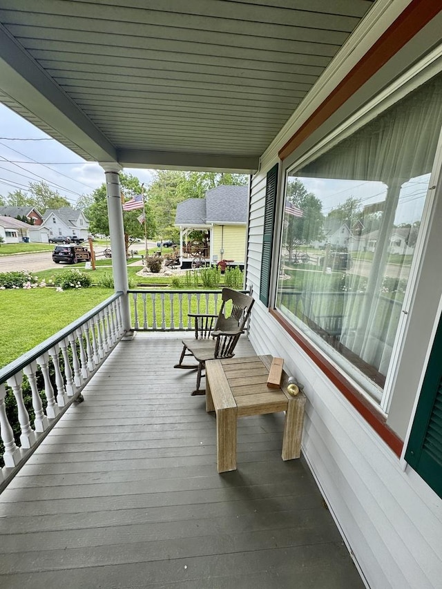 236 S Randolph St, Princeton, IL 61356 - wooden porch with a yard