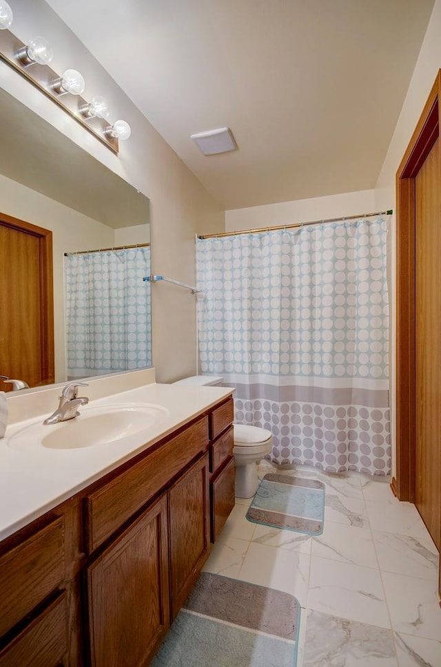 14005 Danbury Dr, Plainfield, IL 60544 - full bathroom with vanity and marble finish floors