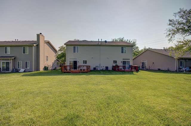 14005 Danbury Dr, Plainfield, IL 60544 - back of property with a deck and a yard