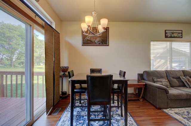 14005 Danbury Dr, Plainfield, IL 60544 - dining room with a chandelier and wood finished floors