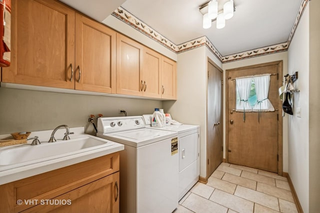 2620 Marian Ln, Wilmette, IL 60091 - washroom featuring cabinet space, washing machine and clothes dryer, and light tile patterned flooring