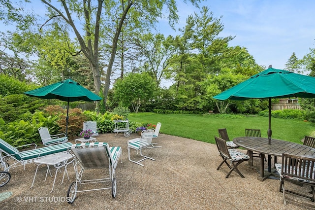 2620 Marian Ln, Wilmette, IL 60091 - view of patio / terrace featuring outdoor dining area and view of wooded area